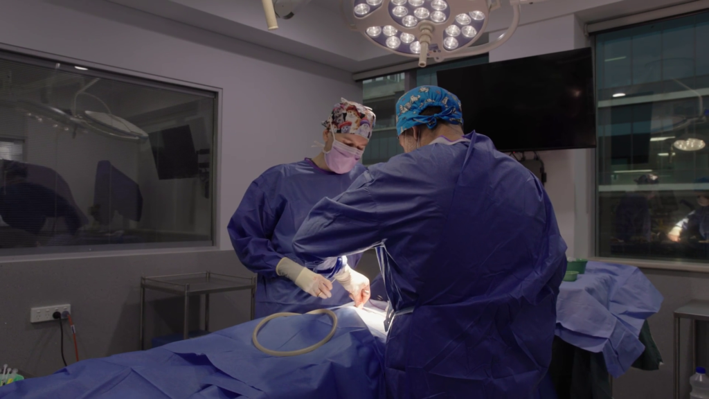surgery specialists performing operation
