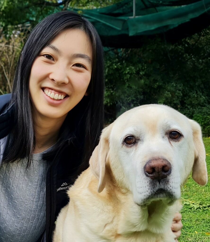 portrait of Dr Jia Wen Siow with dog