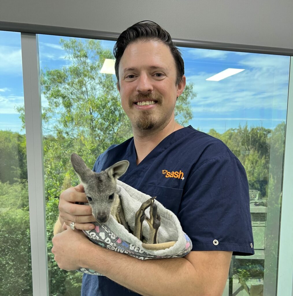 Dr Andrew Adezio with kangaroo