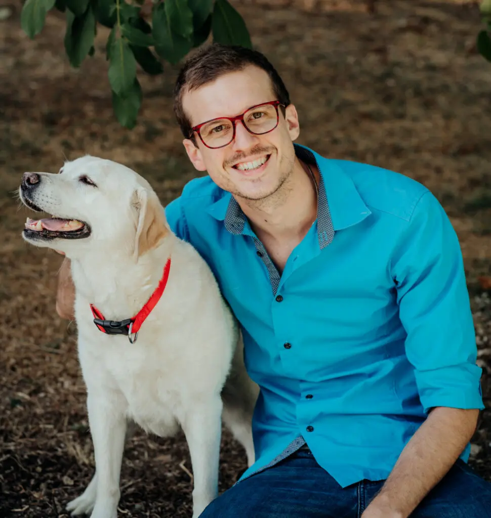Portrait of Dr Matt Kopke with dog