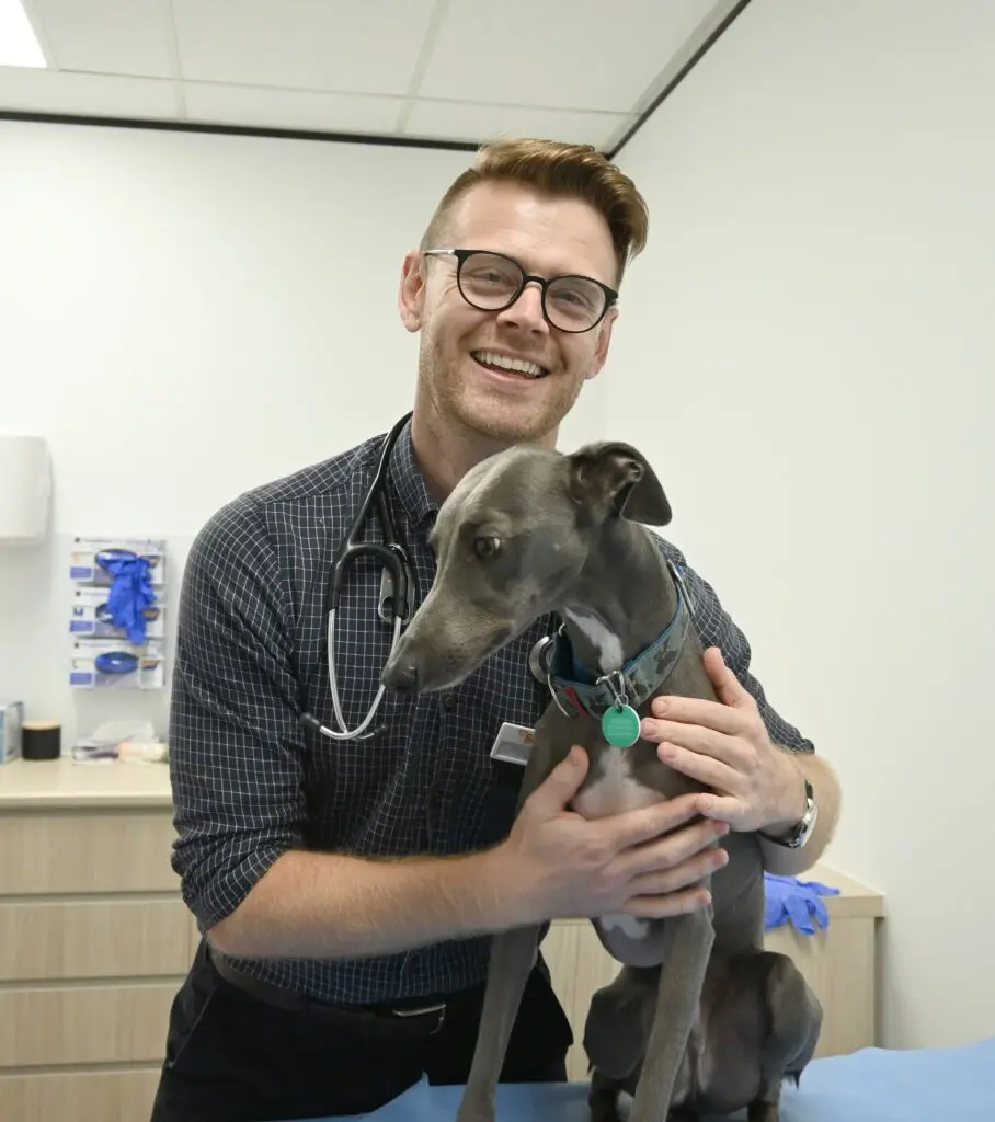 portrait of Dr Tim Hopkins with dog